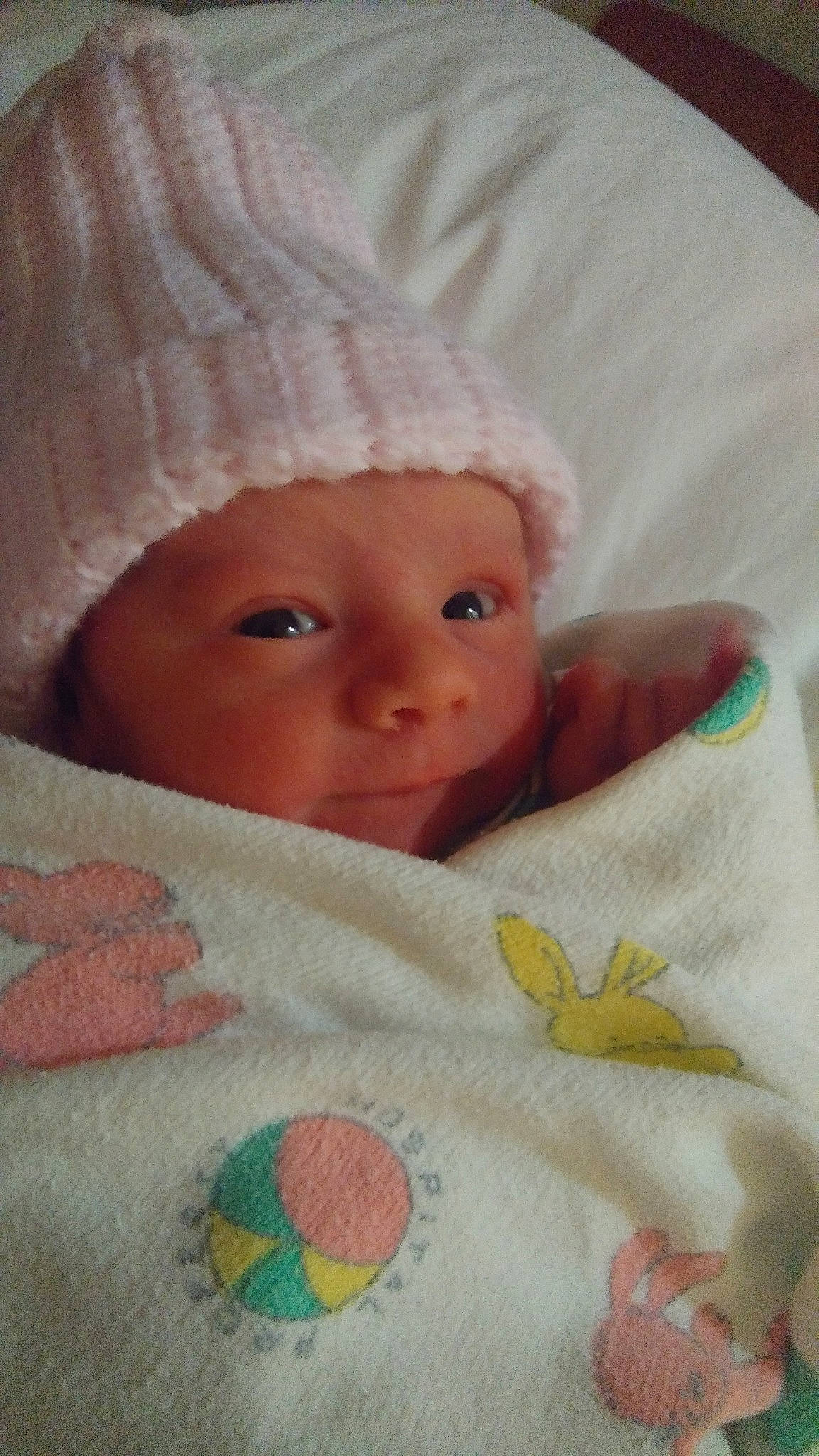 Katalina is registered to the contest to win money with this photo: bedtime, bonnet, cheek, child, eye, head, headwear, infant, iris, knitting, lip, nose, person, pink, product, skin, sleep, textile, toddler, wool