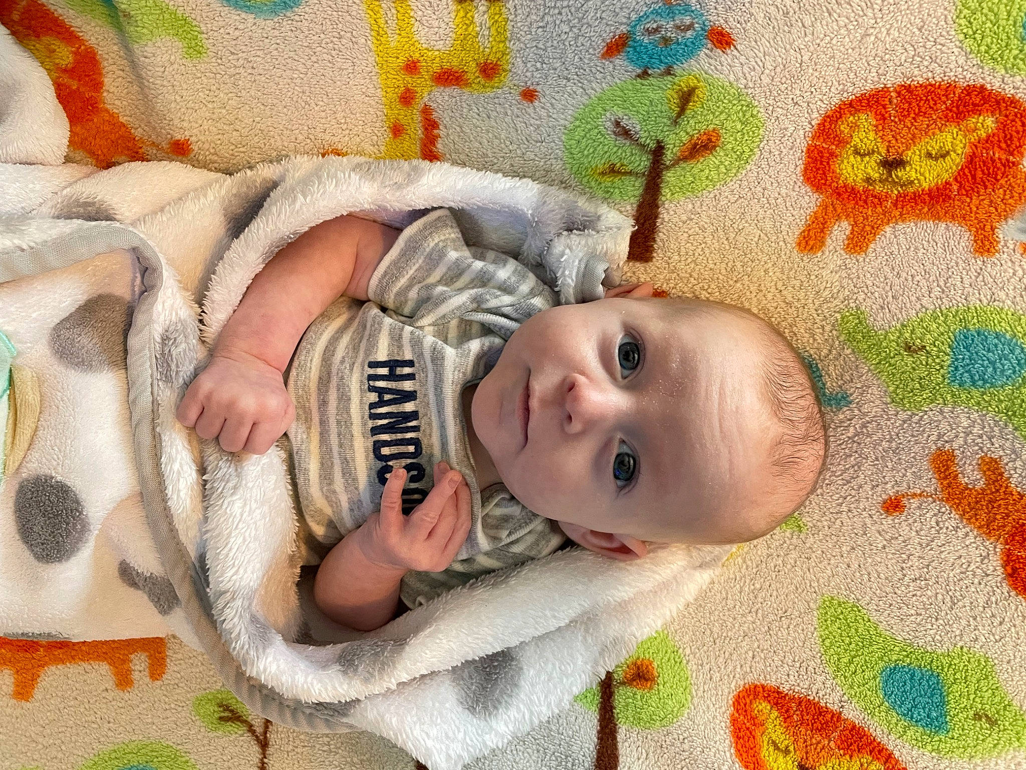 Luke joined the competition — help win amazing prizes! baby, baby_products, baby_safety, baby_toddler_clothing, cheek, child, comfort, eye, face, happy, head, infant_bed, iris, linens, nose, pattern, person, product, skin, textile