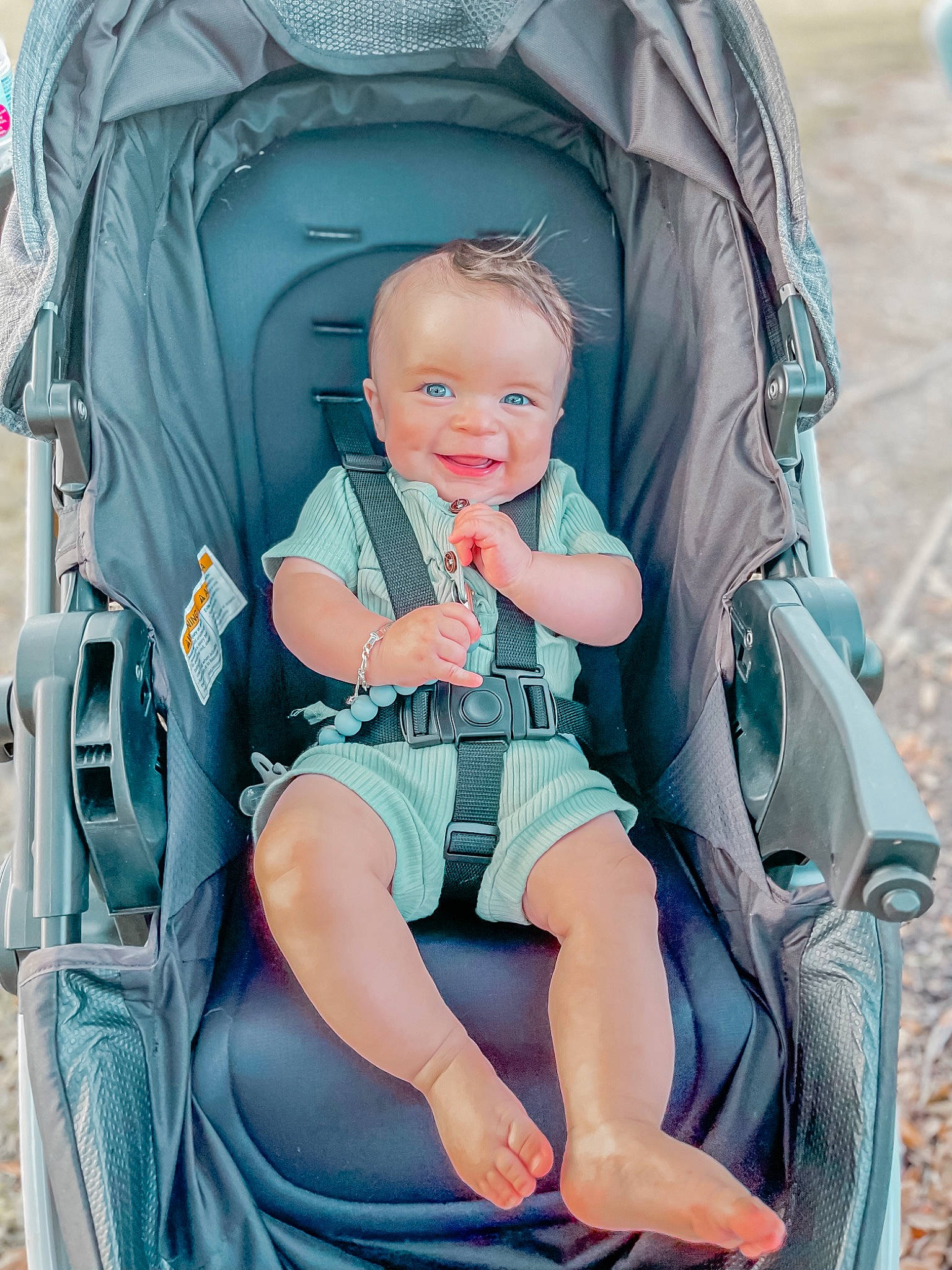 Landyn joined the competition — help win amazing prizes! azure, baby, baby_carriage, baby_products, baby_toddler_clothing, bag, beauty, blue, chair, child, comfort, electric_blue, fashion_accessory, fun, lap, leisure, person, product, sitting, smile
