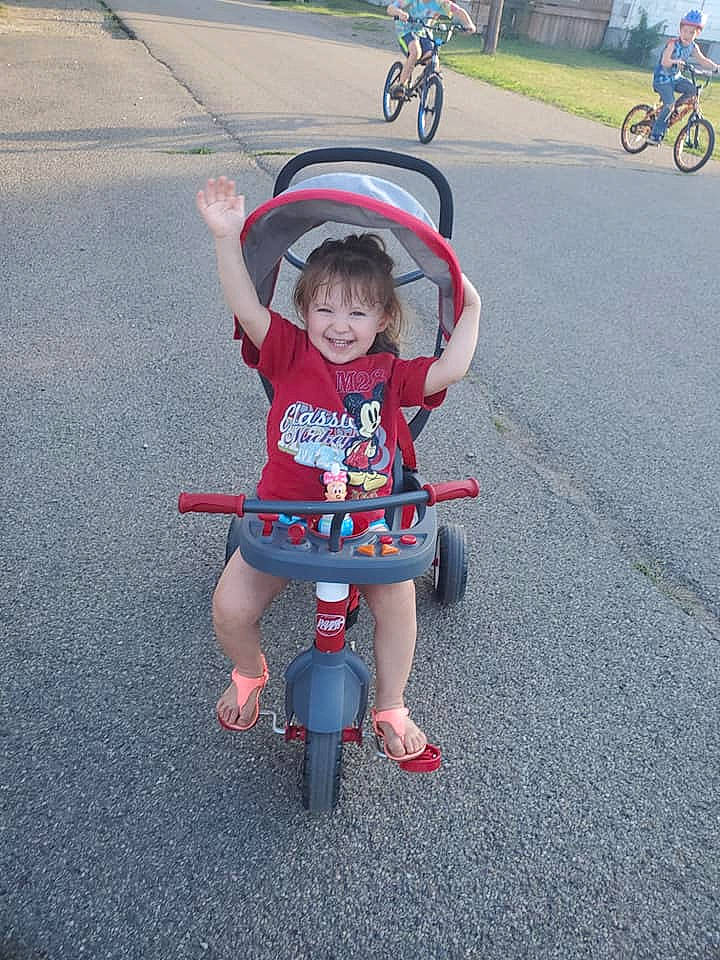 Luxleigh is registered to the contest to win money with this photo: asphalt, baby_carriage, bicycle, bicycle_accessory, bicycle_frame, bicycle_handlebar, bicycle_helmet, bicycle_tire, bicycle_wheel, bicycles_equipment_and_supplies, cycling, helmet, joy, land_vehicle, mode_of_transport, outdoor_recreation, person, smile, tire, toddler