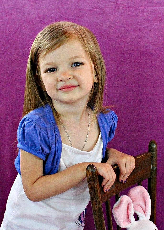 Faythe joined the competition — help win amazing prizes! arm, beauty, blond, chair, cheek, child, chin, electric_blue, facial_expression, hand, happy, iris, joy, long_hair, person, pink, purple, sitting, skin, sleeve