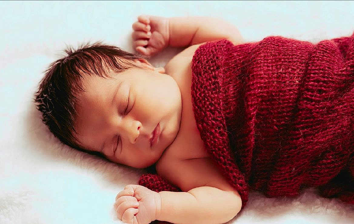 Luis joined the competition — help win amazing prizes! baby, blanket, cozy, cute, face, hands, indoors, infant, lying_down, newborn, peaceful, portrait, red, resting, skin, sleeping, soft, toddler, warm, wrapped