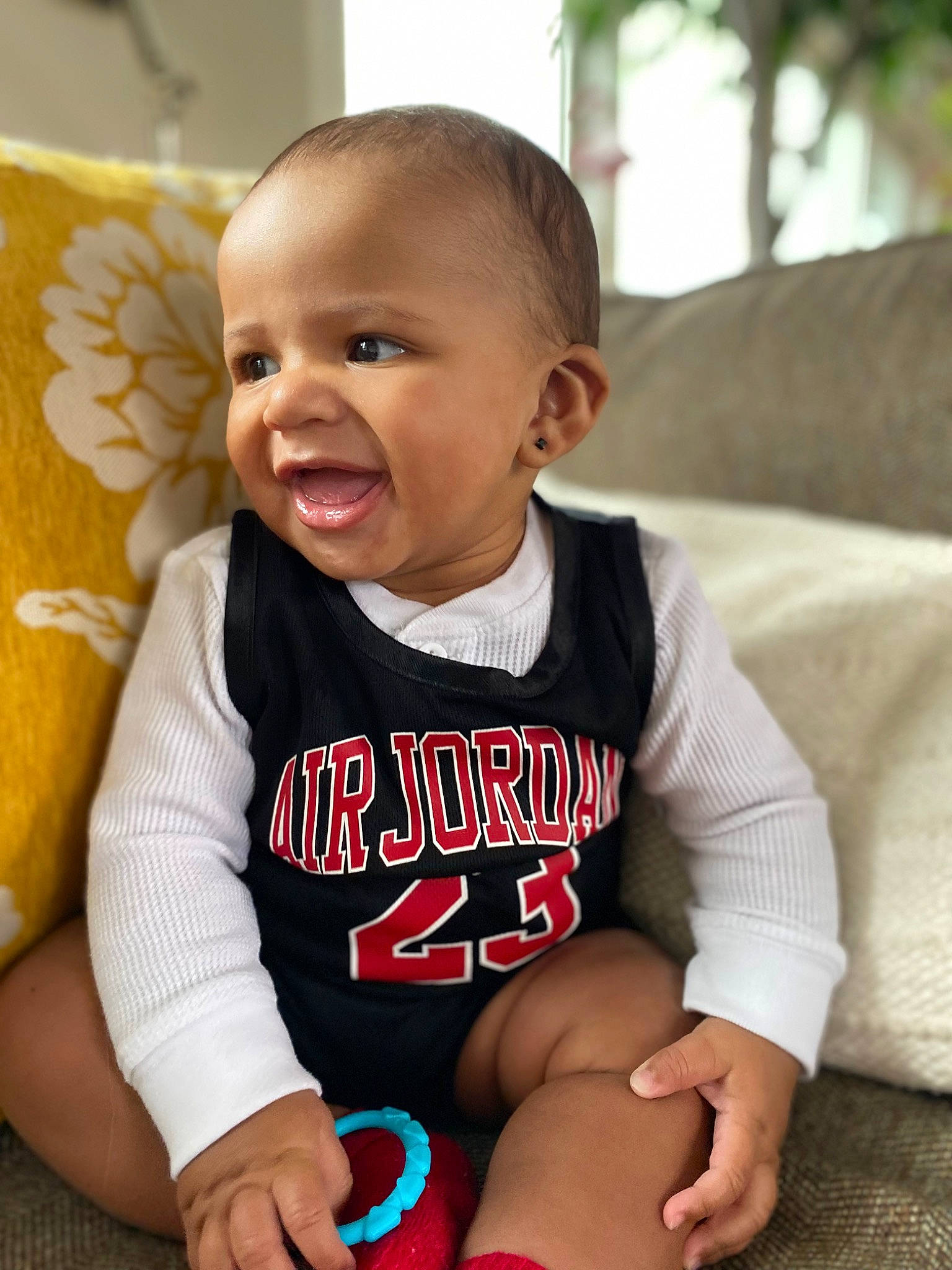 Deangelo is registered to the contest to win money with this photo: arm, baby, baby_toddler_clothing, cheek, chin, clothing, eye, facial_expression, hairstyle, happy, head, leg, mouth, neck, person, product, skin, sleeve, smile, standing