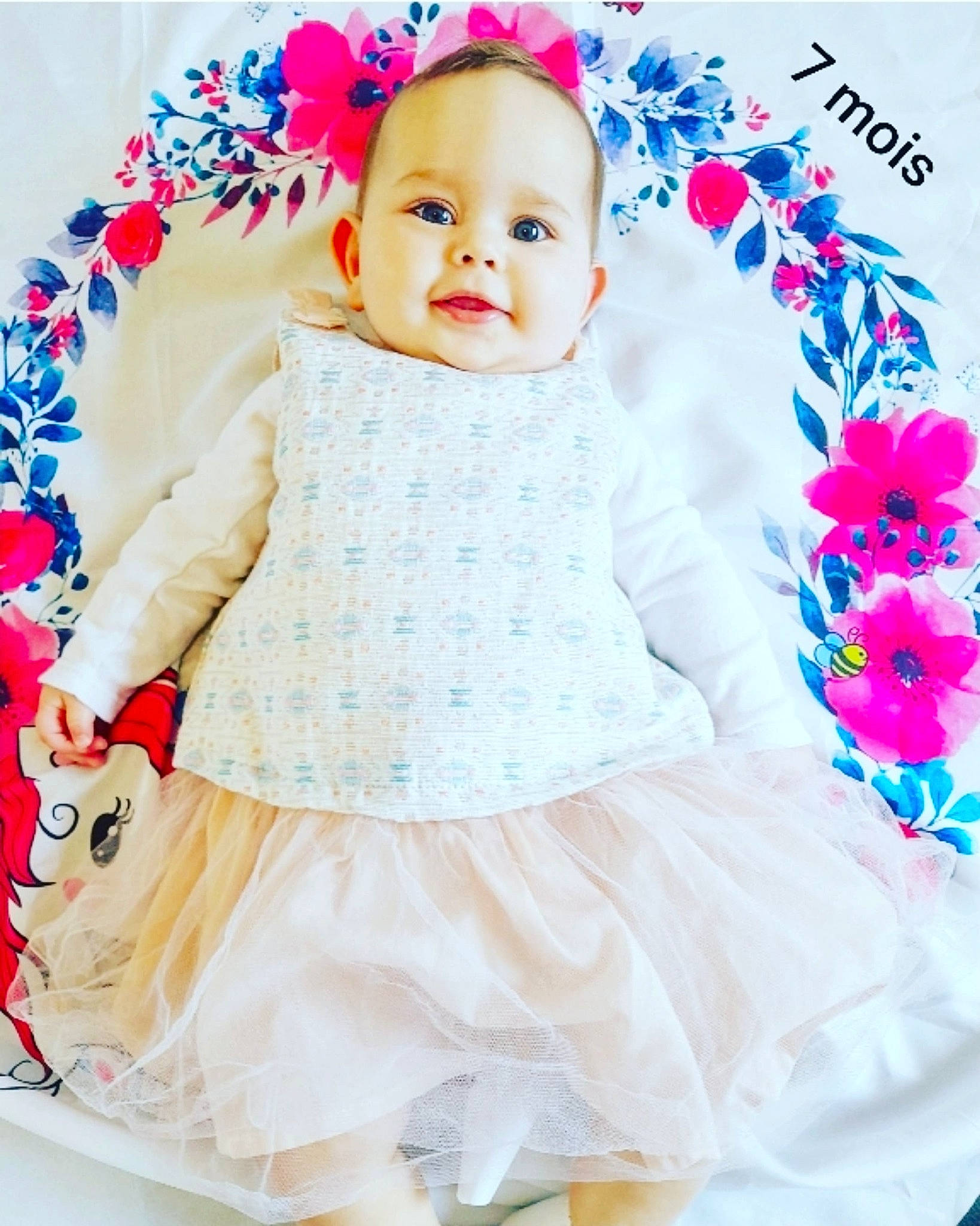 Diana participe au concours pour gagner de l'argent avec cette photo : baby, baby_toddler_clothing, clothing, dress, facial_expression, flower, happy, headgear, outerwear, person, petal, pink, plant, product, skin, sleeve, smile, t_shirt, textile, toddler