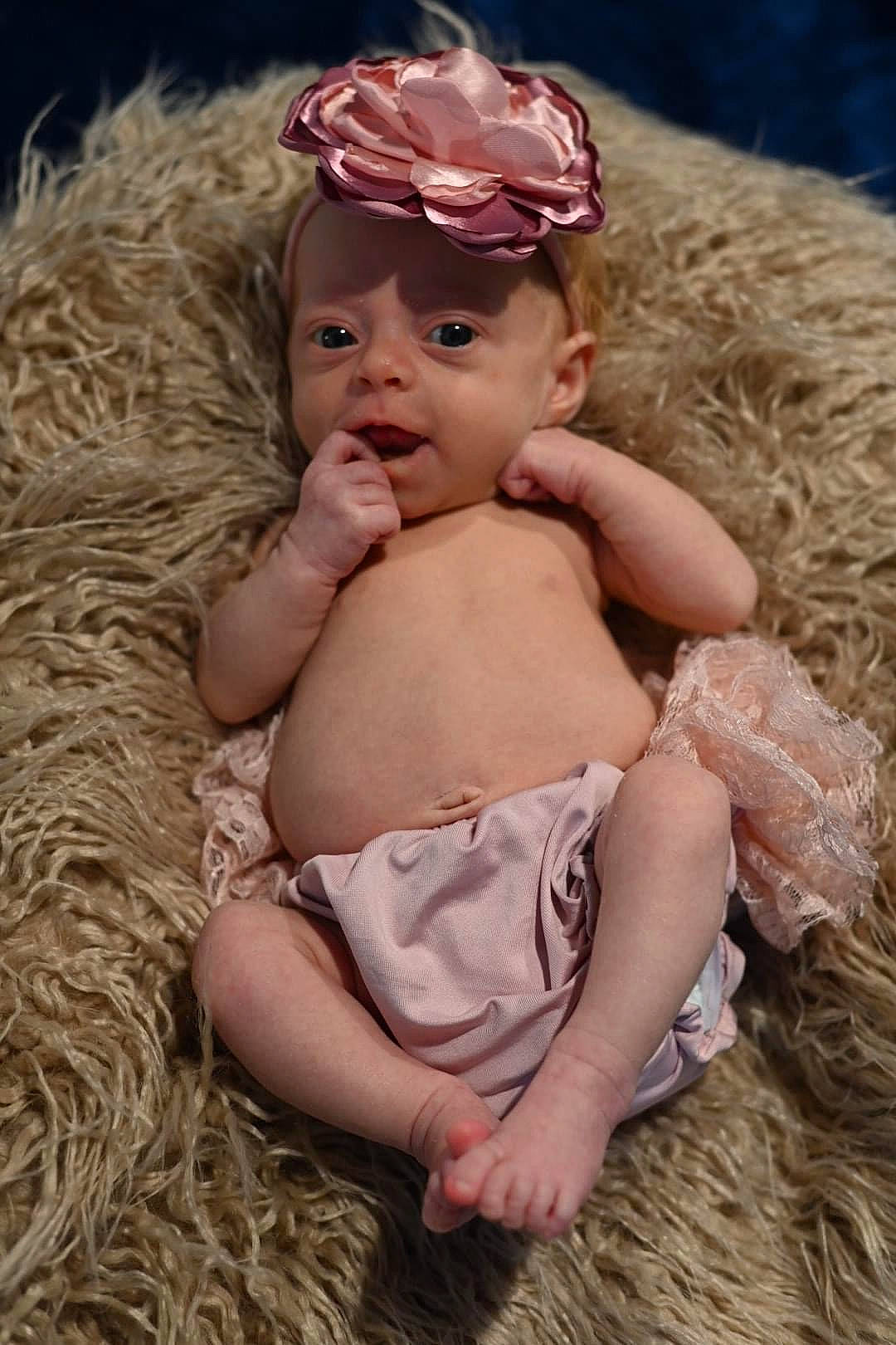 Kynsleigh joined the competition — help win amazing prizes! abdomen, baby, baby_toddler_clothing, child, crown, diaper, fashion_accessory, grass, hair_accessory, happy, headband, headgear, headpiece, headwear, jewellery, peach, person, pink, sitting, skin