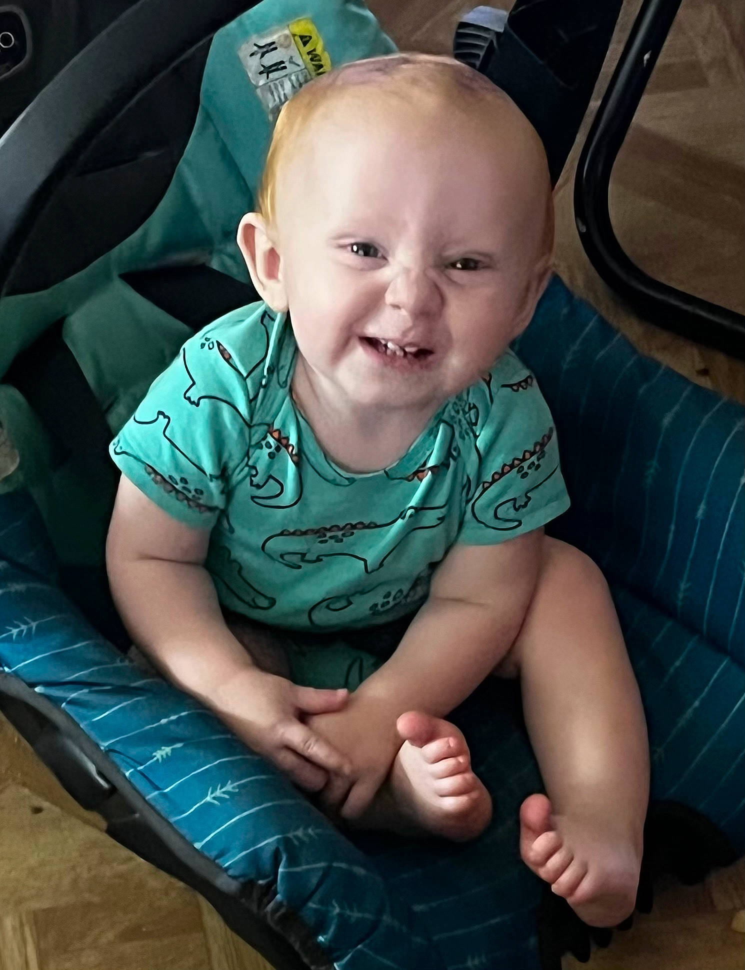 Emryck Zepheryse is registered to the contest to win money with this photo: baby, baby_toddler_clothing, child, comfort, eye, grass, green, hand, happy, iris, joy, motor_vehicle, mouth, person, product, sitting, skin, smile, steering_wheel, thumb