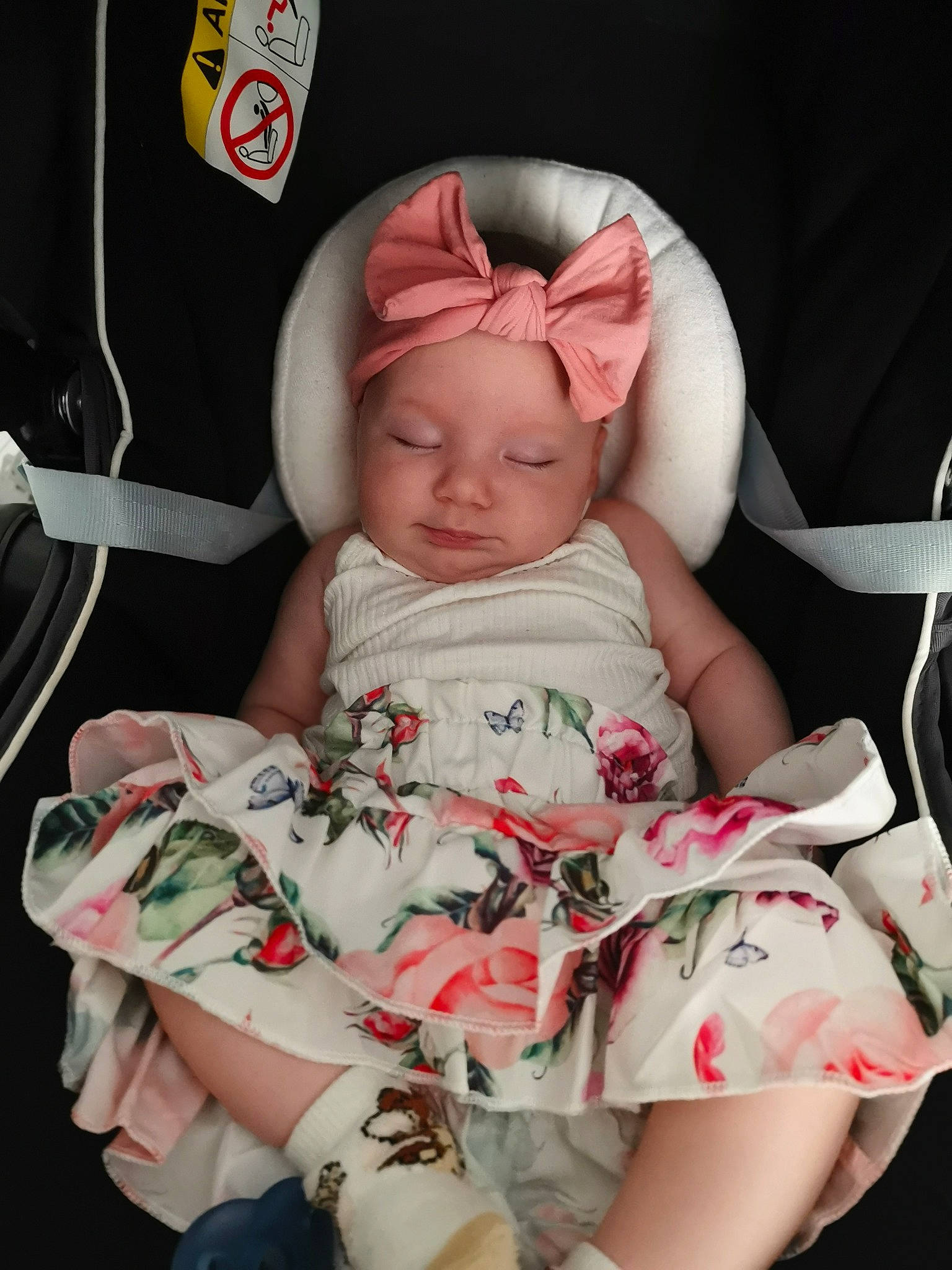 Eva participe au concours pour gagner de l'argent avec cette photo : baby, baby_products, baby_toddler_clothing, cap, cheek, comfort, doll, dress, eye, head, headwear, human_body, lap, linens, pattern, person, pink, skin, sleeve, sock