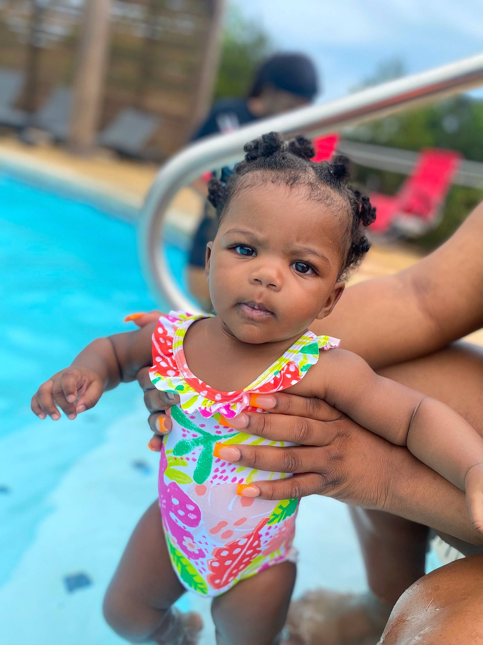 Kiara is registered to the contest to win money with this photo: baby, black_hair, chest, dress, eye, face, hair, happy, head, iris, leisure, lip, mouth, neck, person, recreation, skin, thigh, toddler, trunk