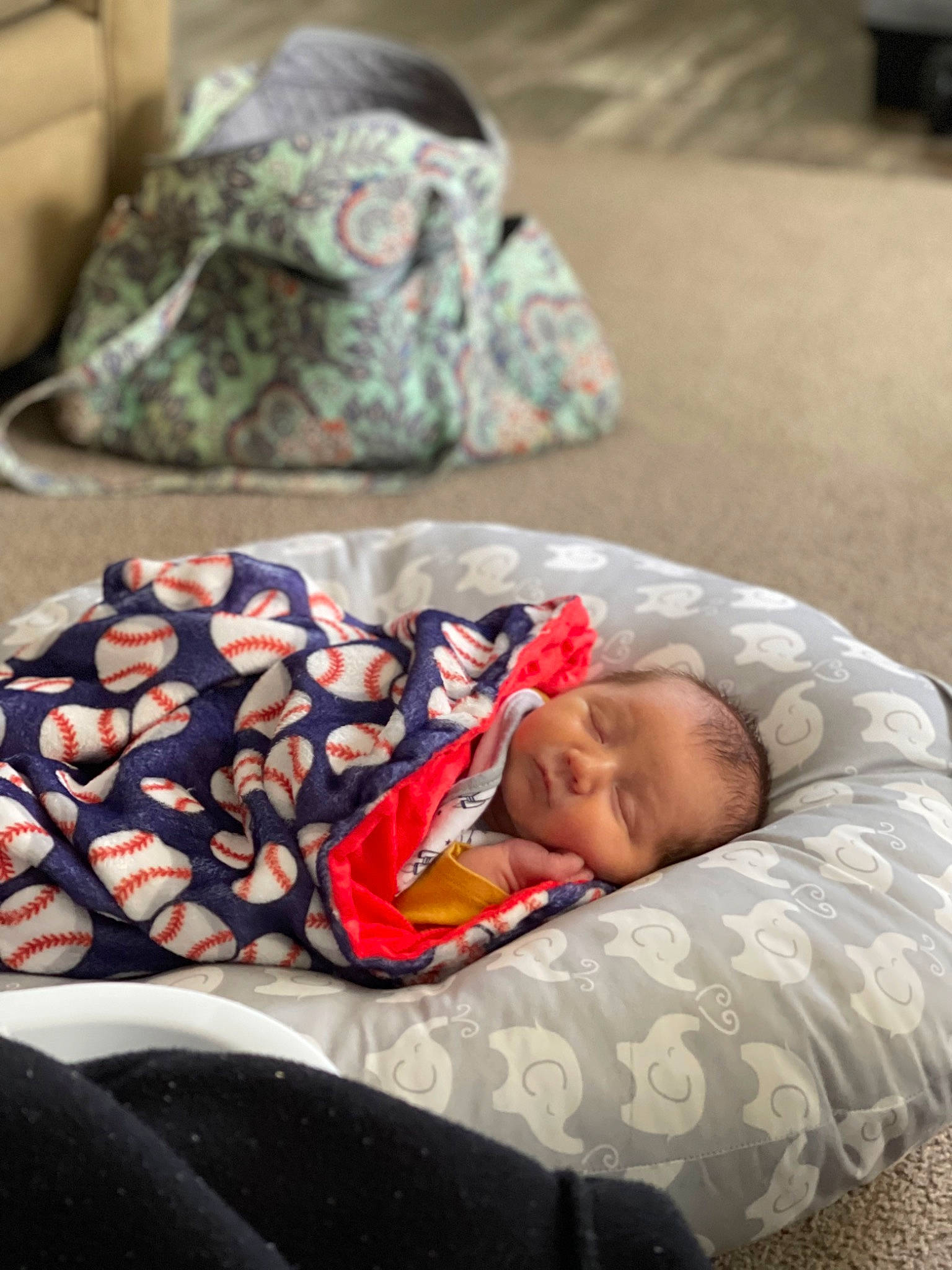 Colton is registered to the contest to win money with this photo: baby, baby_products, baby_sleeping, baby_toddler_clothing, bed, bed_sheet, bedding, bedroom, bedtime, carmine, child, comfort, couch, fashion_accessory, linens, nap, pattern, person, room, sitting