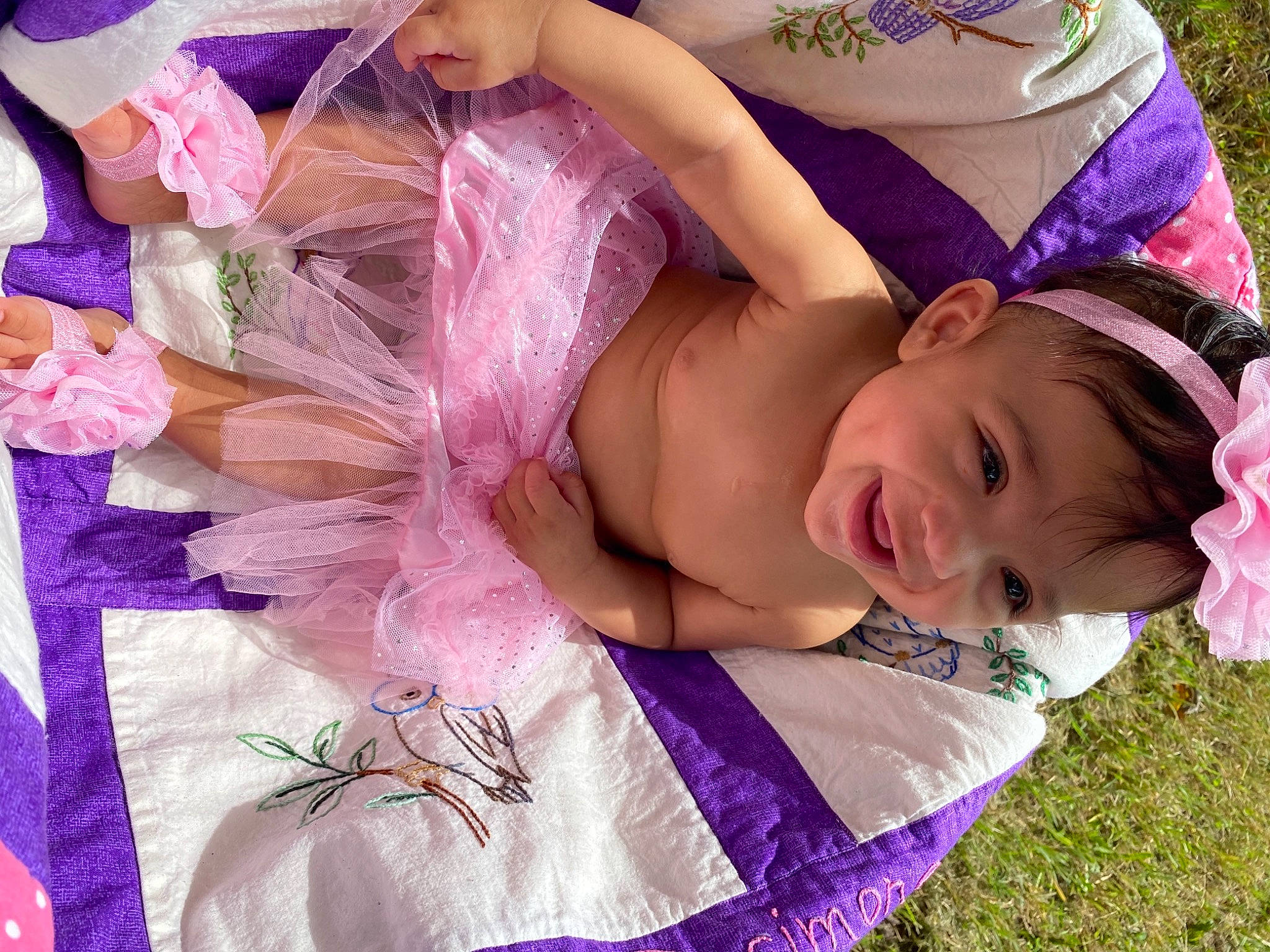Kensleigh is registered to the contest to win money with this photo: abdomen, chest, eyelash, grass, green, happy, headpiece, jewellery, long_hair, magenta, necklace, person, petal, pink, plant, purple, smile, thigh, tree, trunk
