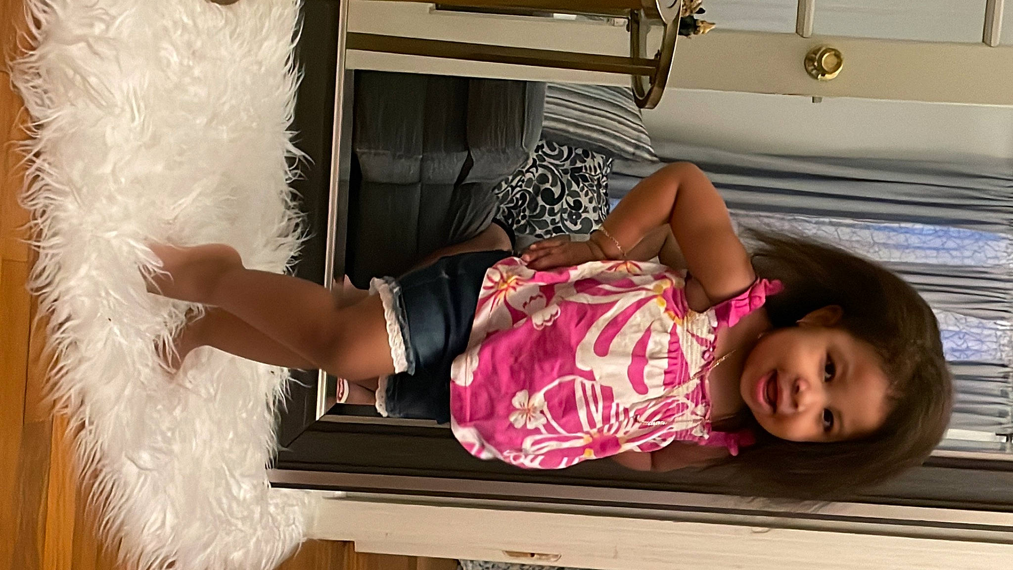 Liah is registered to the contest to win money with this photo: child, comfort, fashion, fashion_design, fun, fur, happy, human, human_leg, kitchen, magenta, person, pink, room, t_shirt, textile, thigh, toddler