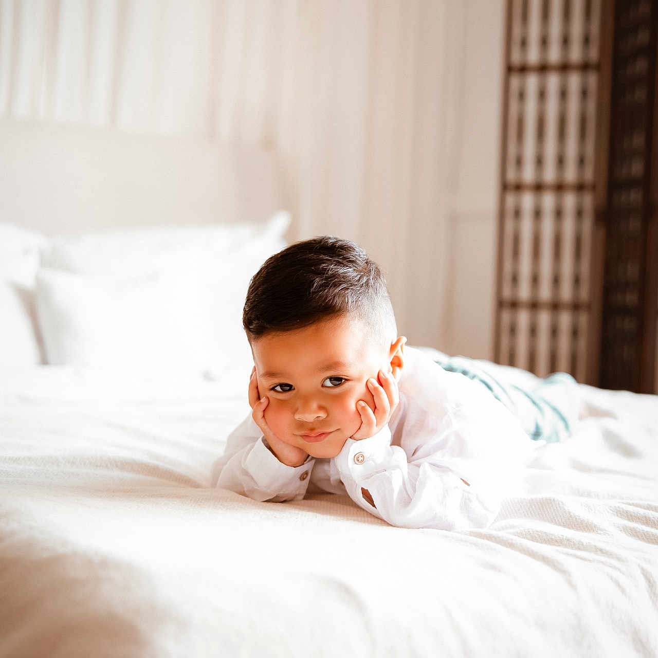 Liam is registered to the contest to win money with this photo: baby, babylaughing, bed, bedroom, blanket, crawling, cushion, face, furniture, happy, head, hiding, indoors, newborn, person, photography, portrait, room, sitting, smile