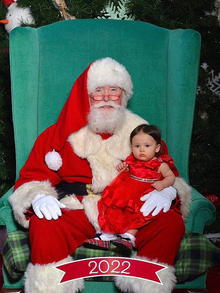 Freya joined the competition — help win amazing prizes! baby, beard, child, christmas, christmas_eve, event, facial_hair, fictional_character, green, happy, headwear, holiday, human_body, interior_design, lap, person, red, santa_claus, sitting, smile