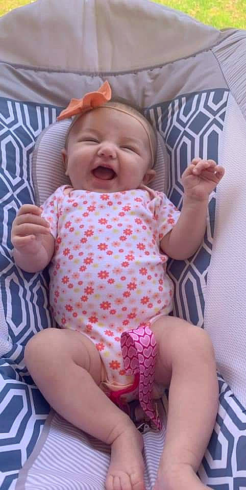 Briella Rose joined the competition — help win amazing prizes! baby, baby_products, baby_toddler_clothing, cheek, child, facial_expression, headwear, pattern, person, product, smile, toddler, yawn