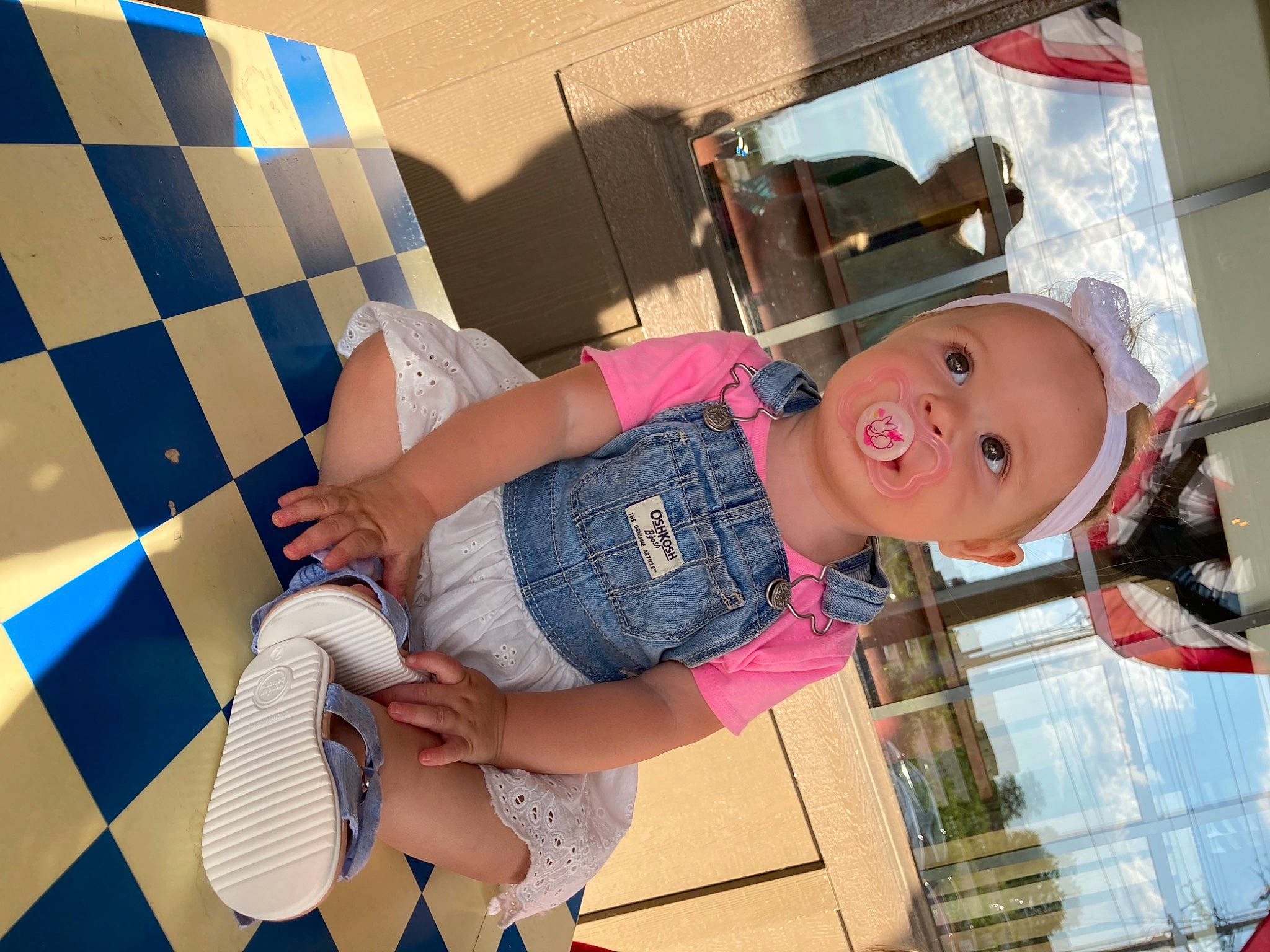 Lynnlee is registered to the contest to win money with this photo: baby, child, fun, happy, hat, headwear, human_leg, indoor_games_and_sports, knee, leisure, pattern, person, pink, room, sandal, shorts, smile, thigh, toddler