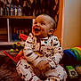 Marley- Jay joined the competition — help win amazing prizes! baby, child, smiling, pajamas, toys, floor, indoor, happy, cute, playtime, colorful, sitting, face, person, home, carpet, shelf, bottle, curtain, infant