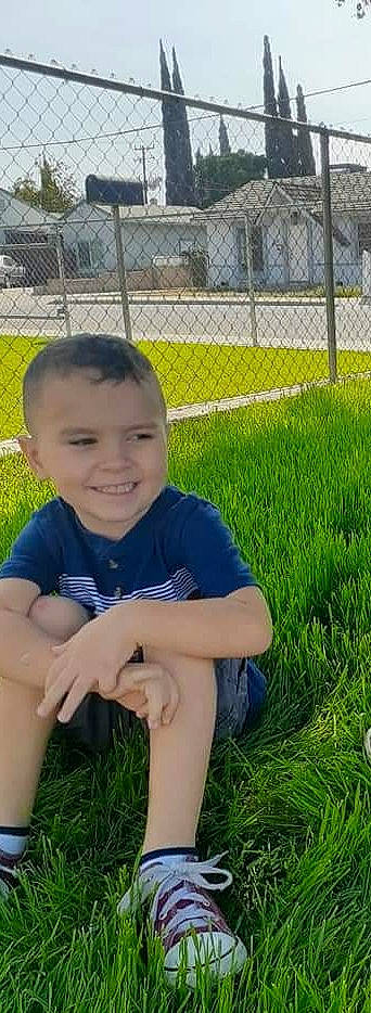 Nicky joined the competition — help win amazing prizes! arm, cheek, child, facial_expression, finger, grass, grass_family, green, joy, lawn, leg, male, meadow, people, person, photograph, play, skin, smile, snapshot