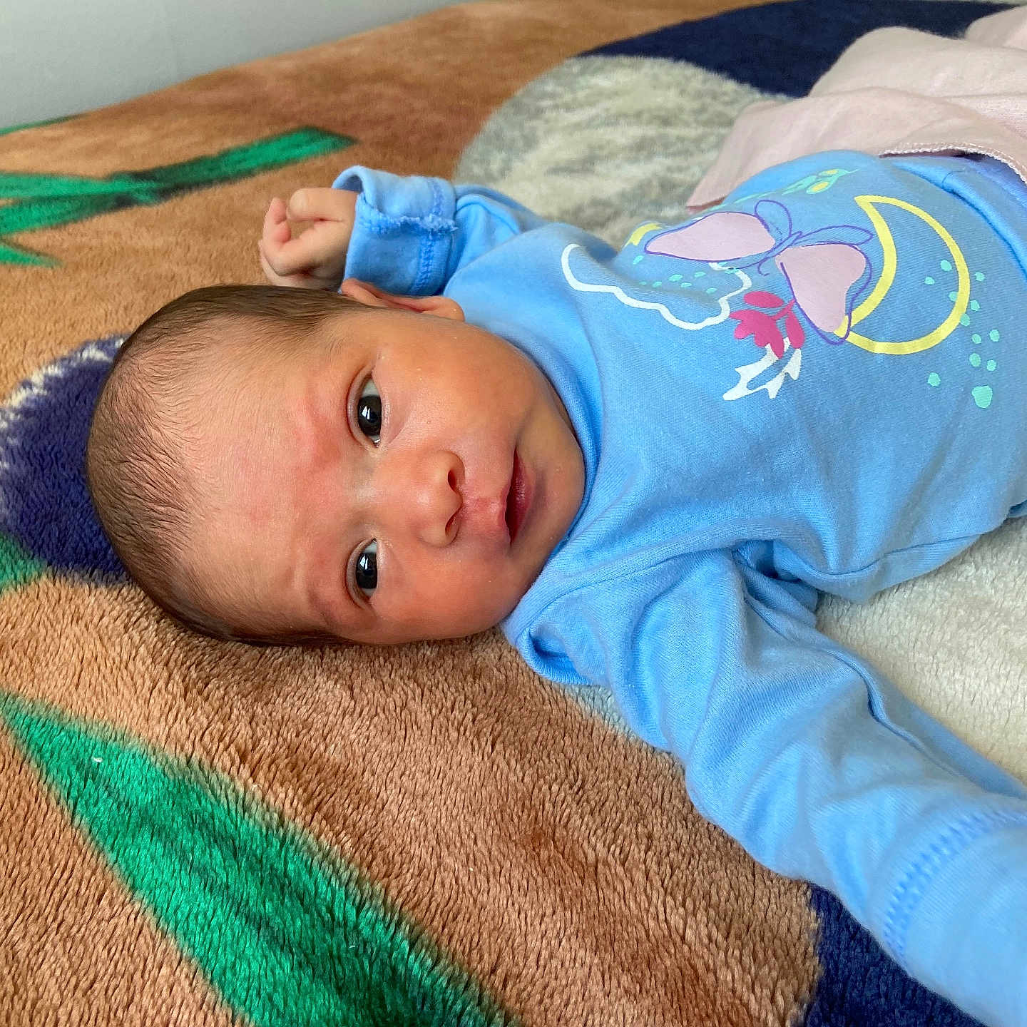 Yeimy joined the competition — help win amazing prizes! baby, blanket, blue_clothing, child, cozy, cute, eyes, face, indoors, infant, lying_down, newborn, newborn_baby, patterned_blanket, person, portrait, resting, sleepwear, small_hand, soft_texture