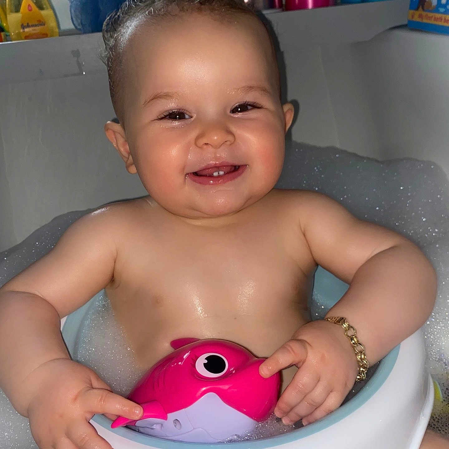 Brodie Blu is registered to the contest to win money with this photo: baby, bath, bathroom, bracelet, bubble_bath, child, cute, face, foam, hands, happy, infant, pink_fish, playful, skin, smiling, toy, tub, water, wet