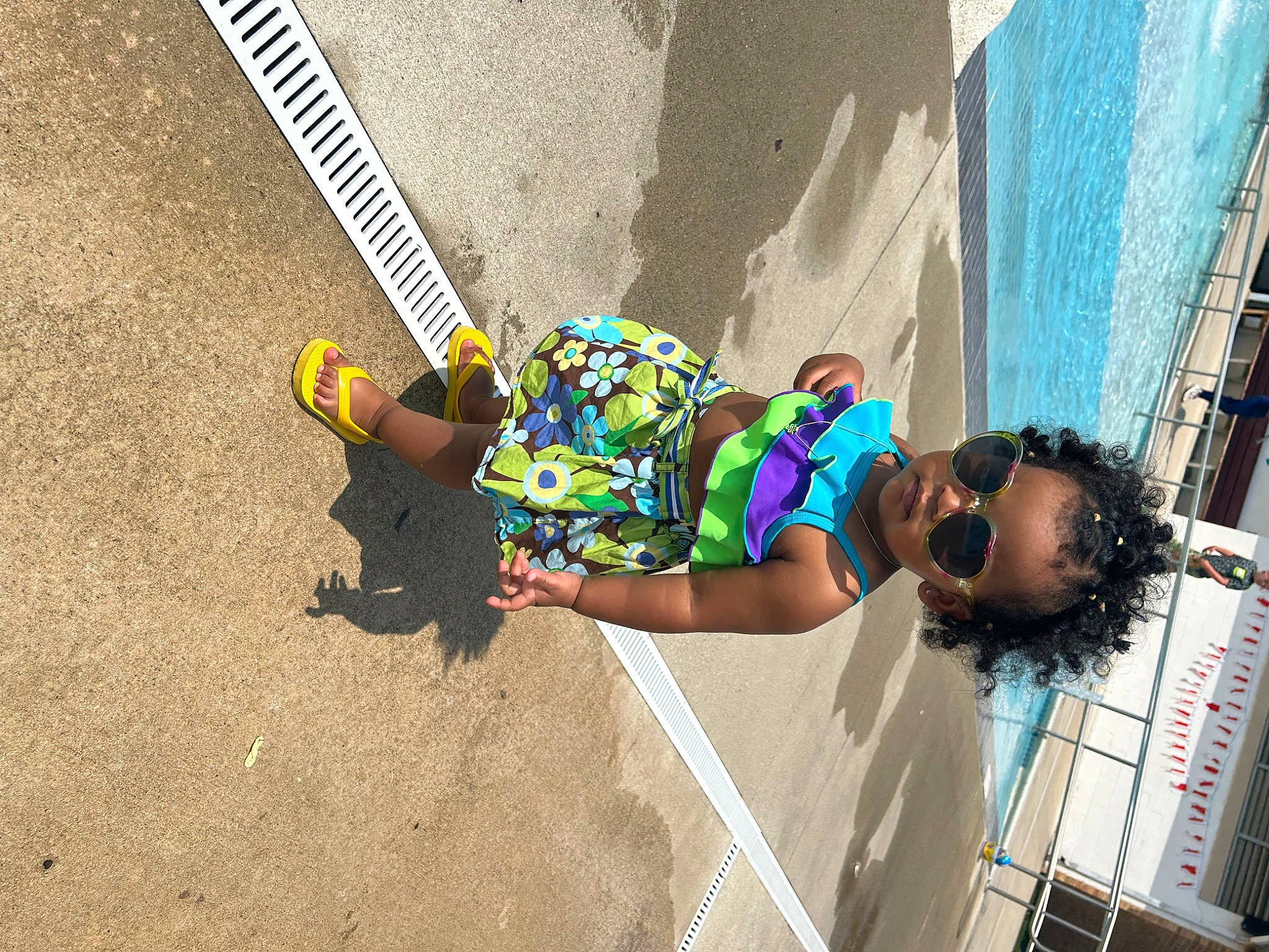 Luna joined the competition — help win amazing prizes! adventure, asphalt, child, concrete, fun, human_leg, knee, leisure, person, recreation, road, road_surface, shadow, shorts, sidewalk, soil, street, thigh, water