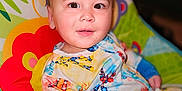Jamison joined the competition — help win amazing prizes! baby, bed, blanket, bodypart, clothing, crib, cushion, dress, face, furniture, happy, head, homedecor, infantbed, newborn, person, photography, portrait, quilt, smile