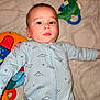 Jamison is registered to the contest to win money with this photo: baby, bed, blanket, bodypart, clothing, couch, face, finger, furniture, hand, happy, head, homedecor, newborn, pajamas, person, photography, portrait, smile, toy