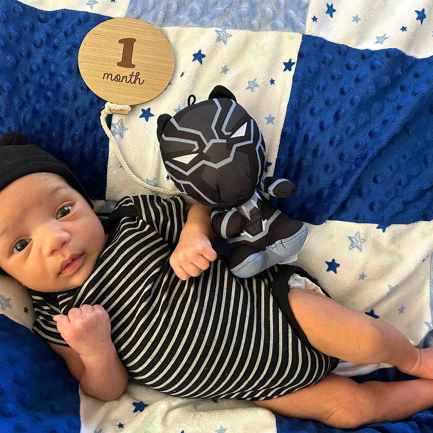 Jesse Jr is registered to the contest to win money with this photo: baby, ball, bed, blanket, cap, clothing, cushion, face, football, furniture, hat, head, homedecor, newborn, person, photography, portrait, quilt, soccer, soccerball