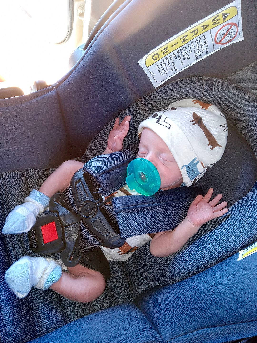 Hudson is registered to the contest to win money with this photo: auto_part, automotive_design, baby, baby_in_car_seat, baby_products, baby_toddler_clothing, car_seat, car_seat_cover, child, comfort, electric_blue, family_car, head_restraint, motor_vehicle, person, personal_protective_equipment, product, seat_belt, steering_part, toddler