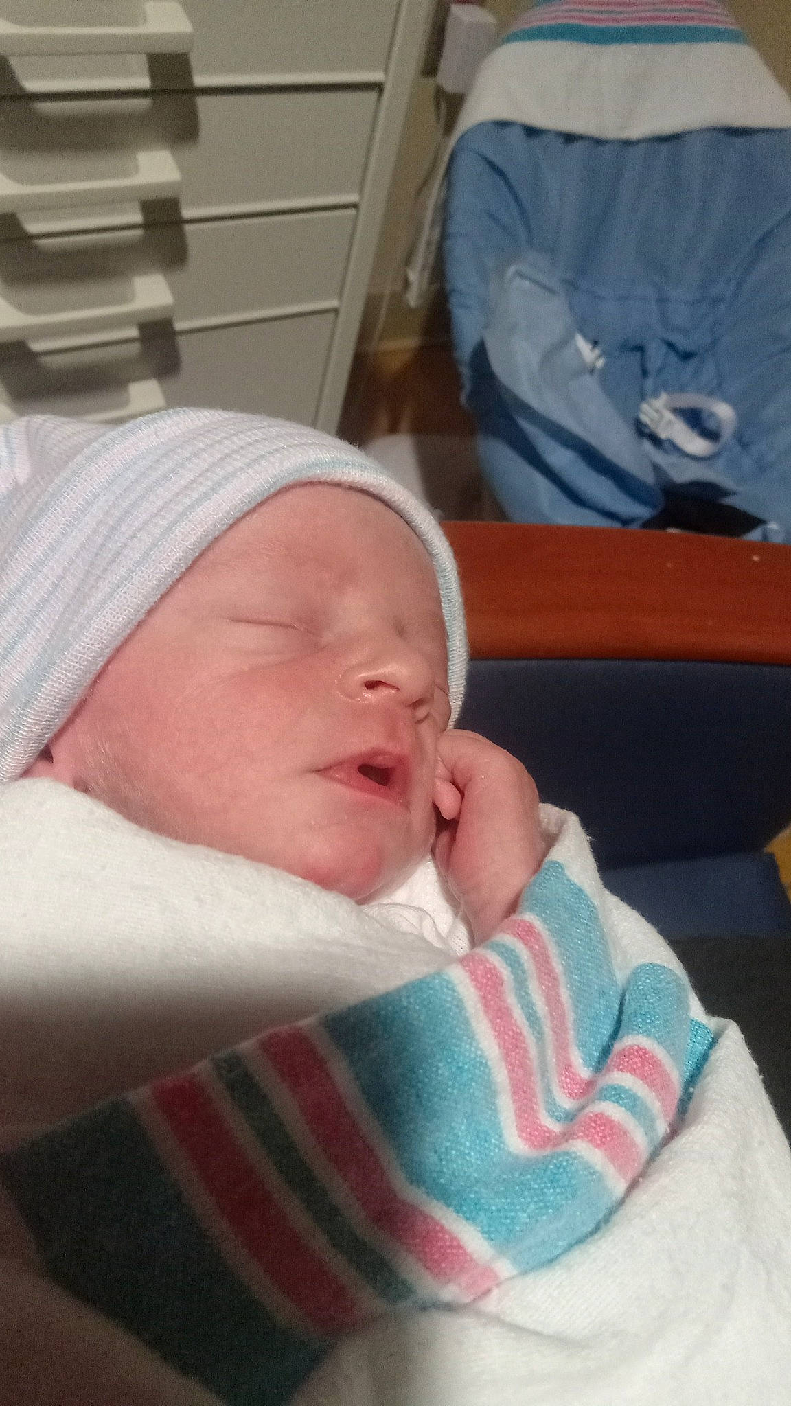 Hudson is registered to the contest to win money with this photo: baby, baby_products, baby_safety, baby_sleeping, baby_toddler_clothing, bedtime, cap, cheek, child, childbirth, comfort, hat, linens, nap, person, room, skin, sleep, thumb, toddler