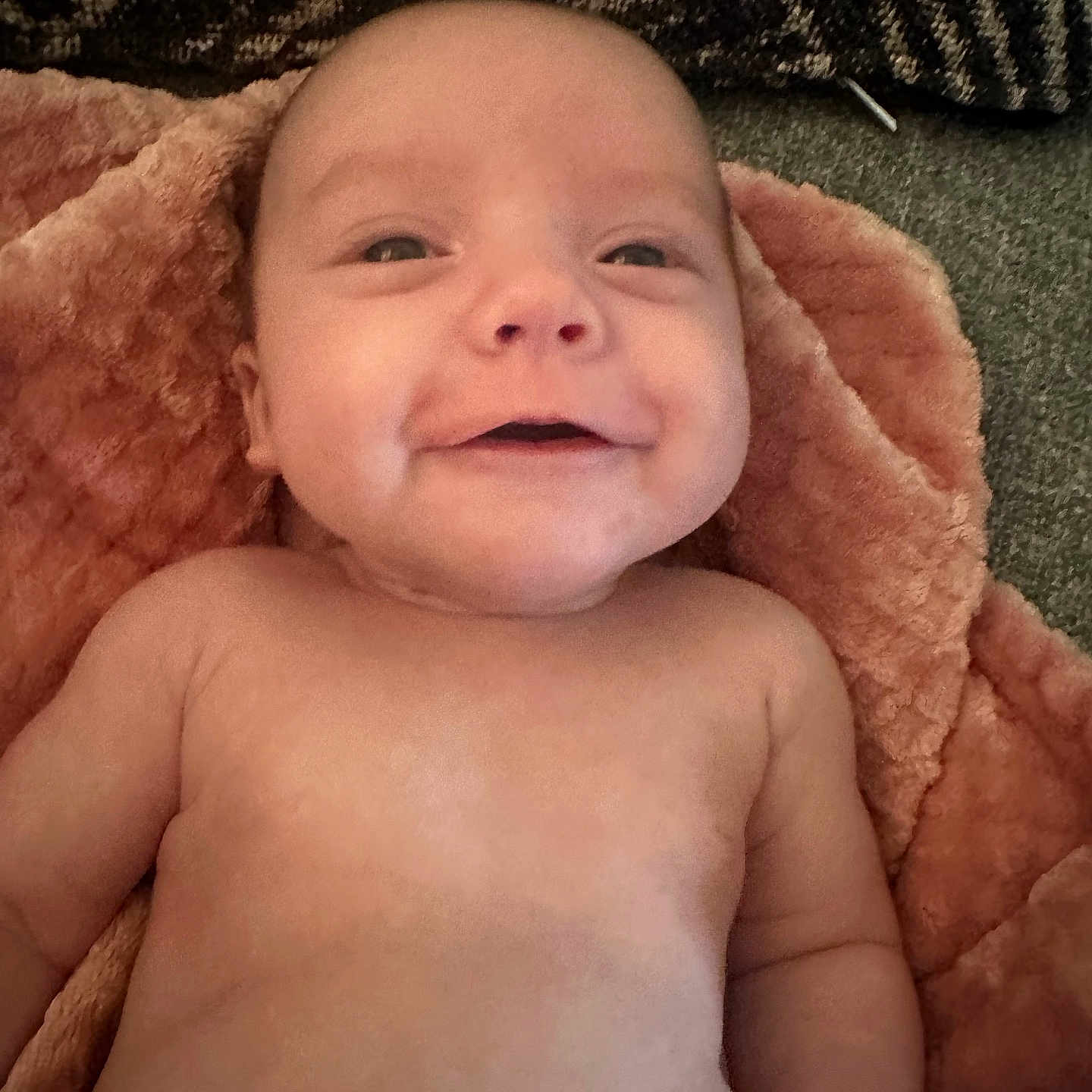 Isla is registered to the contest to win money with this photo: baby, blanket, cushion, face, furniture, happy, head, homedecor, laughing, newborn, person, photography, portrait, quilt, selfie, sleeping, smile, towel