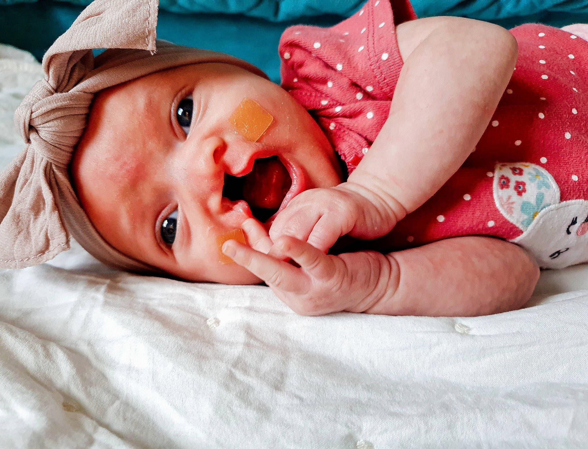 Astrid is registered to the contest to win money with this photo: baby, baby_toddler_clothing, child, comfort, linens, lip, person, portrait_photography, toddler