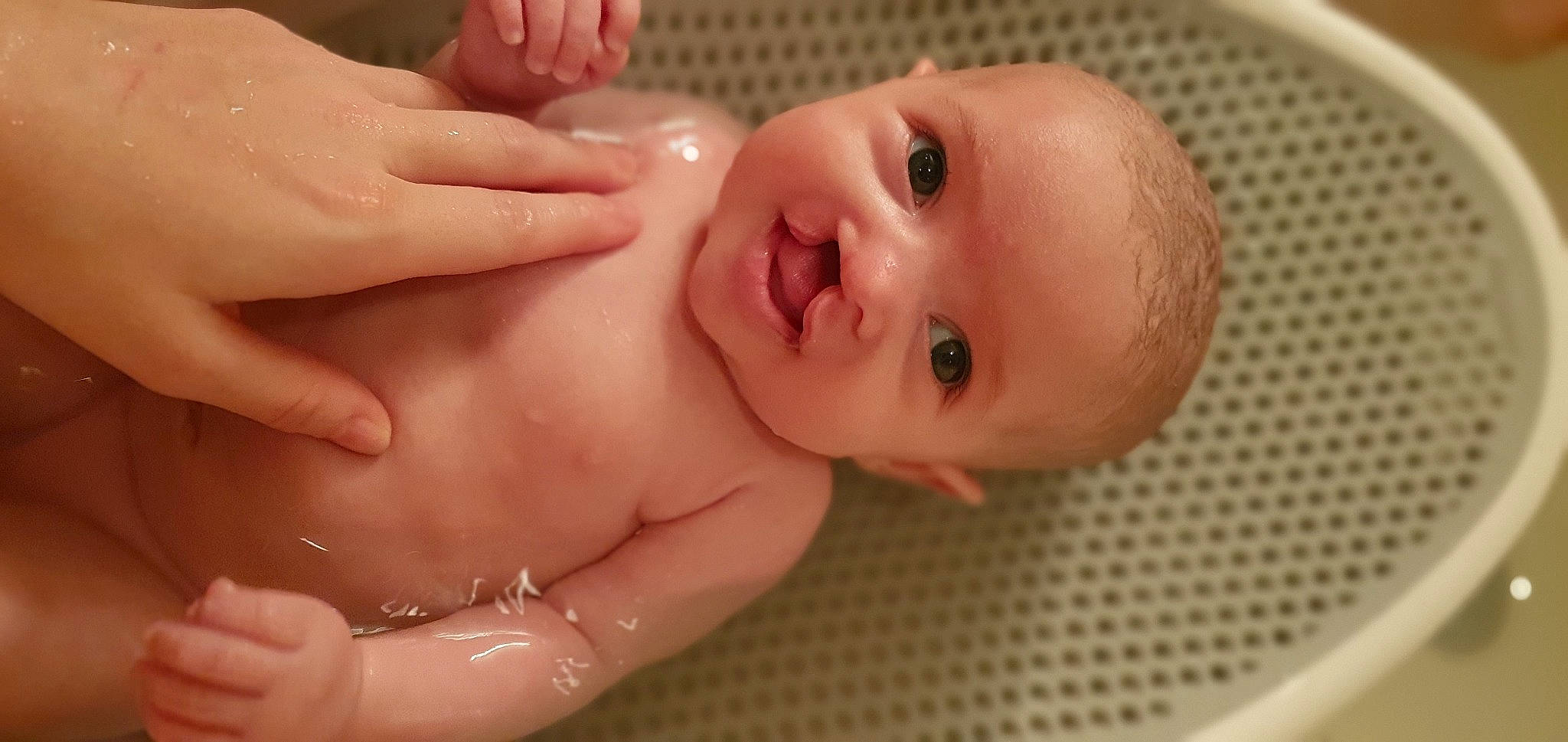 Astrid is registered to the contest to win money with this photo: baby_bathing, baby_products, bathing, cheek, child, eye, eyebrow, eyelash, finger, fluid, joint, lip, liquid, muscle, nail, neck, organ, person, product, skin