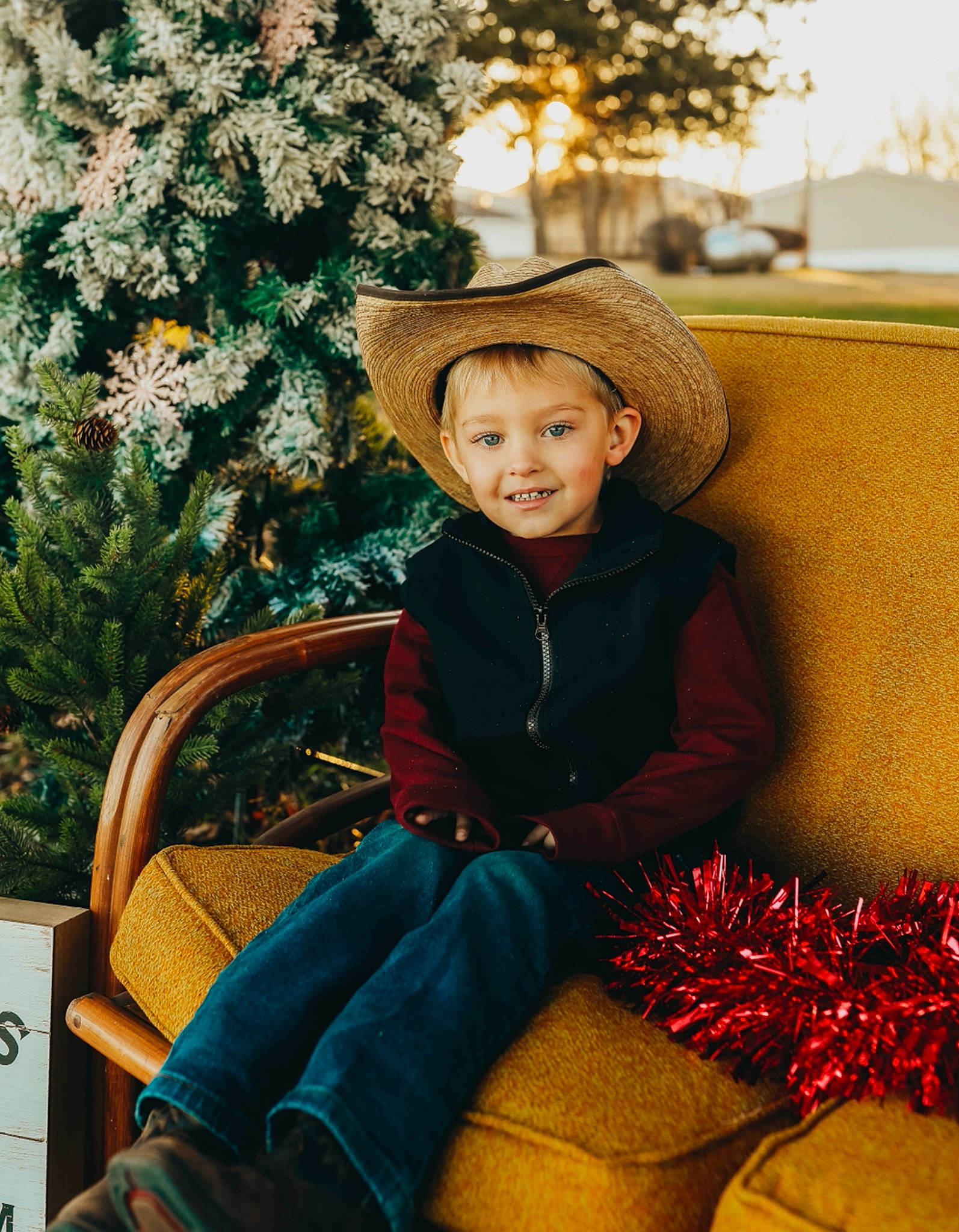 Ryett is registered to the contest to win money with this photo: child_model, comfort, conifer, costume_accessory, costume_hat, fir, fur, hat, headgear, joy, lap, mouth, nose, person, portrait, sitting, sun_hat