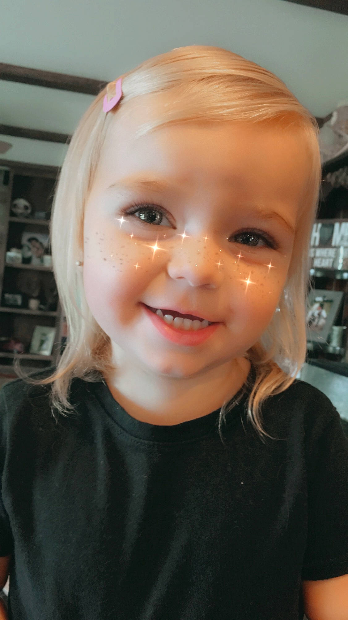 Paislee is registered to the contest to win money with this photo: blond, cheek, child, child_model, chin, eye, eyebrow, eyelash, face, forehead, hairstyle, head, iris, joy, lip, nose, organ, person, shelf, shelving