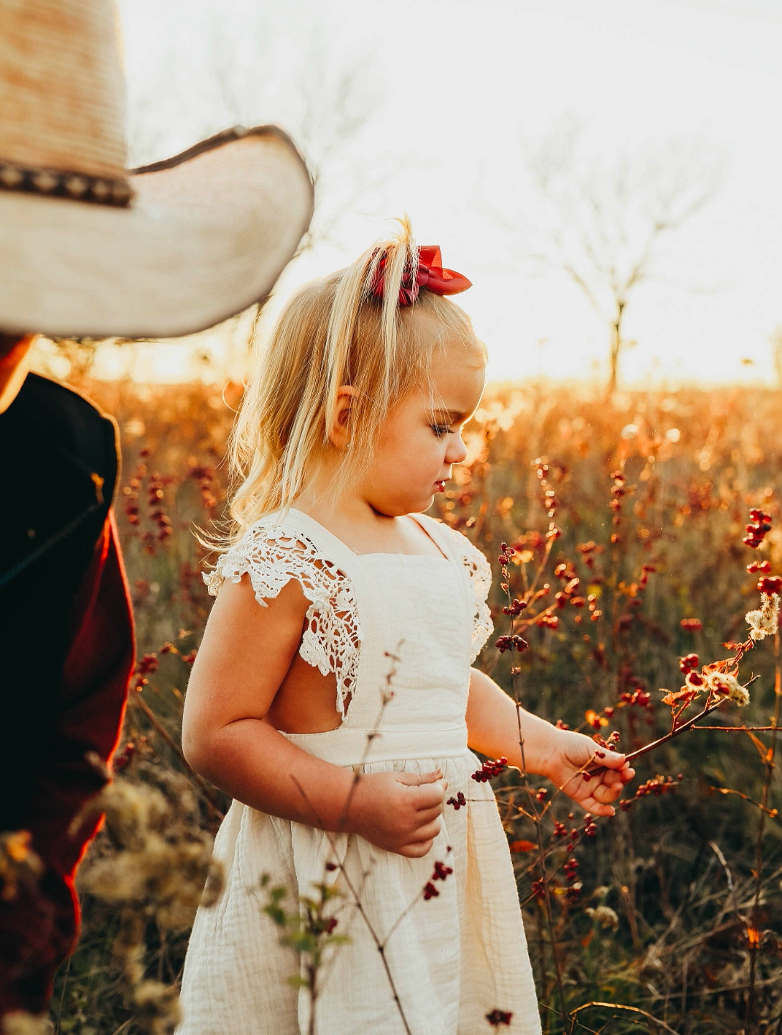 Paislee joined the competition — help win amazing prizes! baby, baby_toddler_clothing, blond, child, child_model, day_dress, dress, embellishment, field, hair_accessory, headband, headpiece, meadow, peach, people_in_nature, person, spring, sunlight, toddler, wildflower