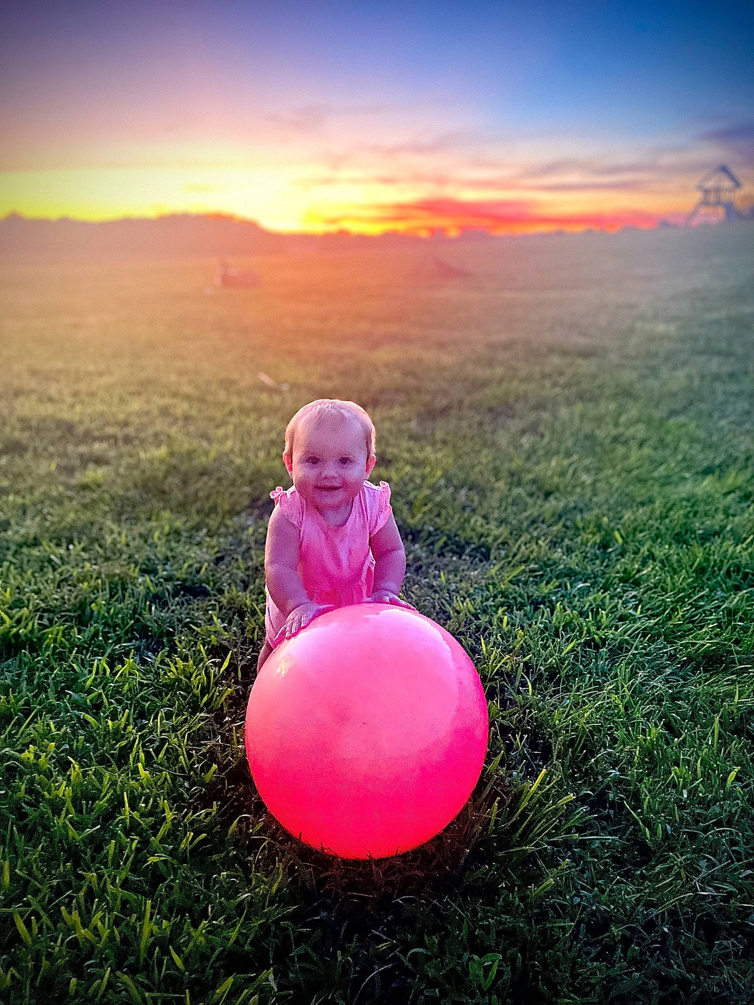 Bailey is registered to the contest to win money with this photo: atmosphere, baby, baby_toddler_clothing, beauty, cloud, face, flash_photography, fun, grass, grassland, happy, horizon, joy, landscape, meadow, natural_environment, natural_landscape, people_in_nature, person, sky
