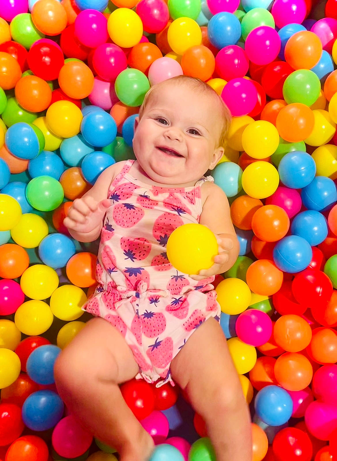 Bailey joined the competition — help win amazing prizes! baby_playing_with_toys, baby_toddler_clothing, ball, ball_pit, beauty, child, facial_expression, fun, happy, joy, leisure, people, person, photograph, play, playground, playing_sports, product, smile, snapshot