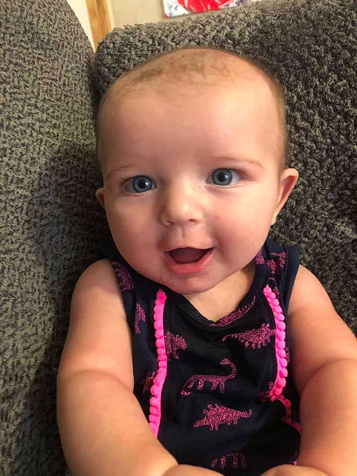 Addison is registered to the contest to win money with this photo: baby, beauty, cheek, child, chin, close_up, ear, eye, eyebrow, face, forehead, hair, head, lip, nose, people, person, pink, skin, smile