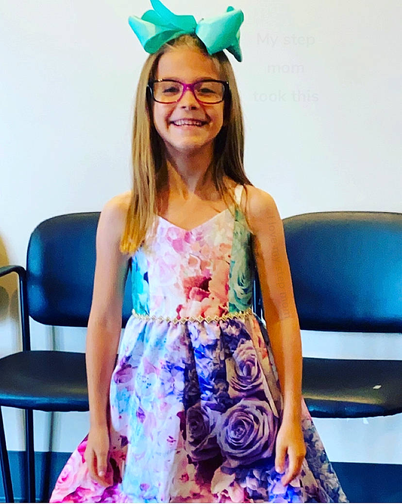 Danielle is registered to the contest to win money with this photo: aqua, beauty, blue, chair, day_dress, dress, electric_blue, facial_expression, fashion, fashion_design, fun, green, hairstyle, happy, joy, long_hair, one_piece_garment, person, photograph, smile