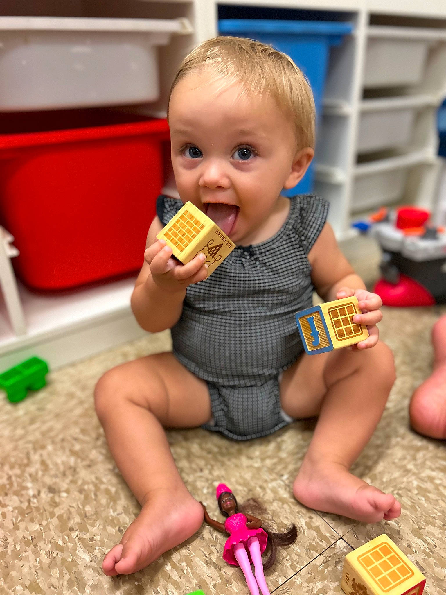 Leilani joined the competition — help win amazing prizes! baby, baby_playing_with_toys, baby_toddler_clothing, biting, chair, child, comfort_food, eating, finger, flooring, foot, fun, human_leg, nail, person, play, sitting, surprise, thigh, thumb