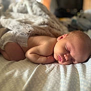 Ryder joined the competition — help win amazing prizes! baby, newborn, sleeping, blanket, bed, soft, peaceful, infant, skin, face, rest, cozy, nap, quiet, cute, child, indoors, portrait, closeup, comfort