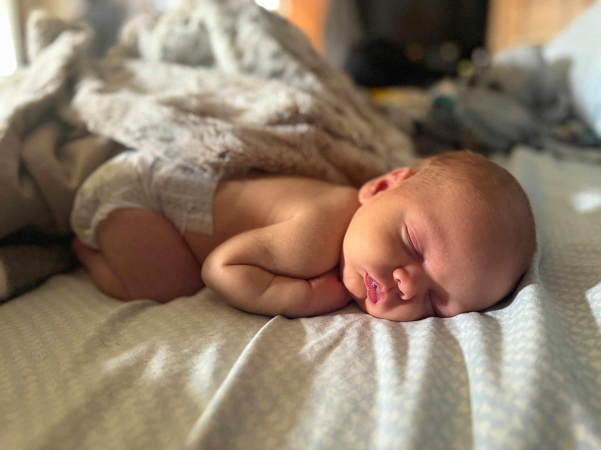 Ryder joined the competition — help win amazing prizes! baby, newborn, sleeping, blanket, bed, soft, peaceful, infant, skin, face, rest, cozy, nap, quiet, cute, child, indoors, portrait, closeup, comfort