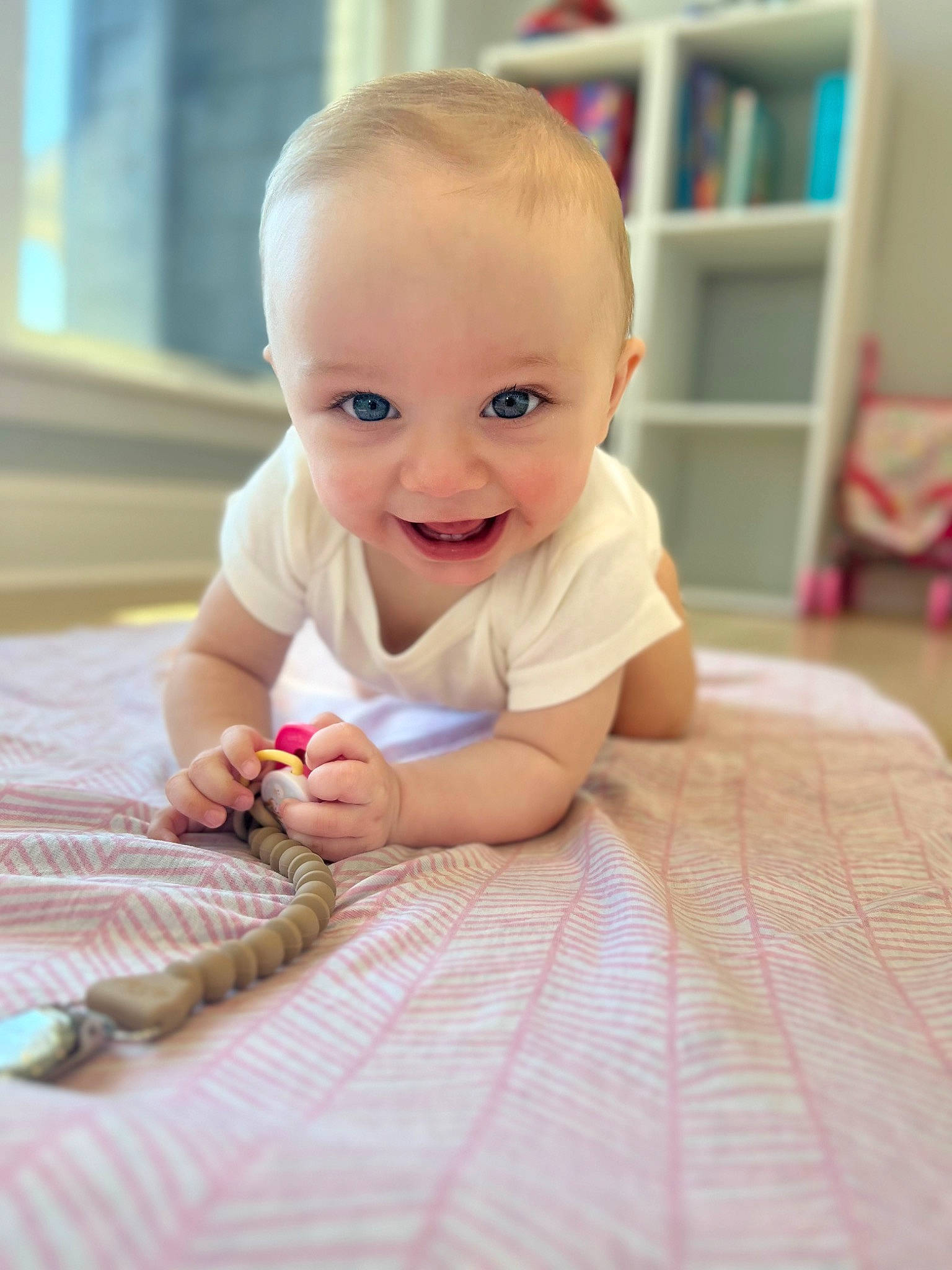 Leilani joined the competition — help win amazing prizes! arm, baby, baby_toddler_clothing, cheek, comfort, finger, floor, flooring, fun, happy, human_body, iris, joy, nose, person, shelf, skin, sleeve, smile, thumb