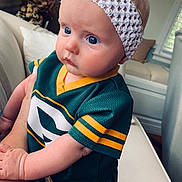 Hadley joined the competition — help win amazing prizes! baby, baby_products, baby_toddler_clothing, beanie, bonnet, cap, cheek, child, clothing, cool, eye, hat, head, headgear, knit_cap, product, skin, toddler, turquoise, yellow