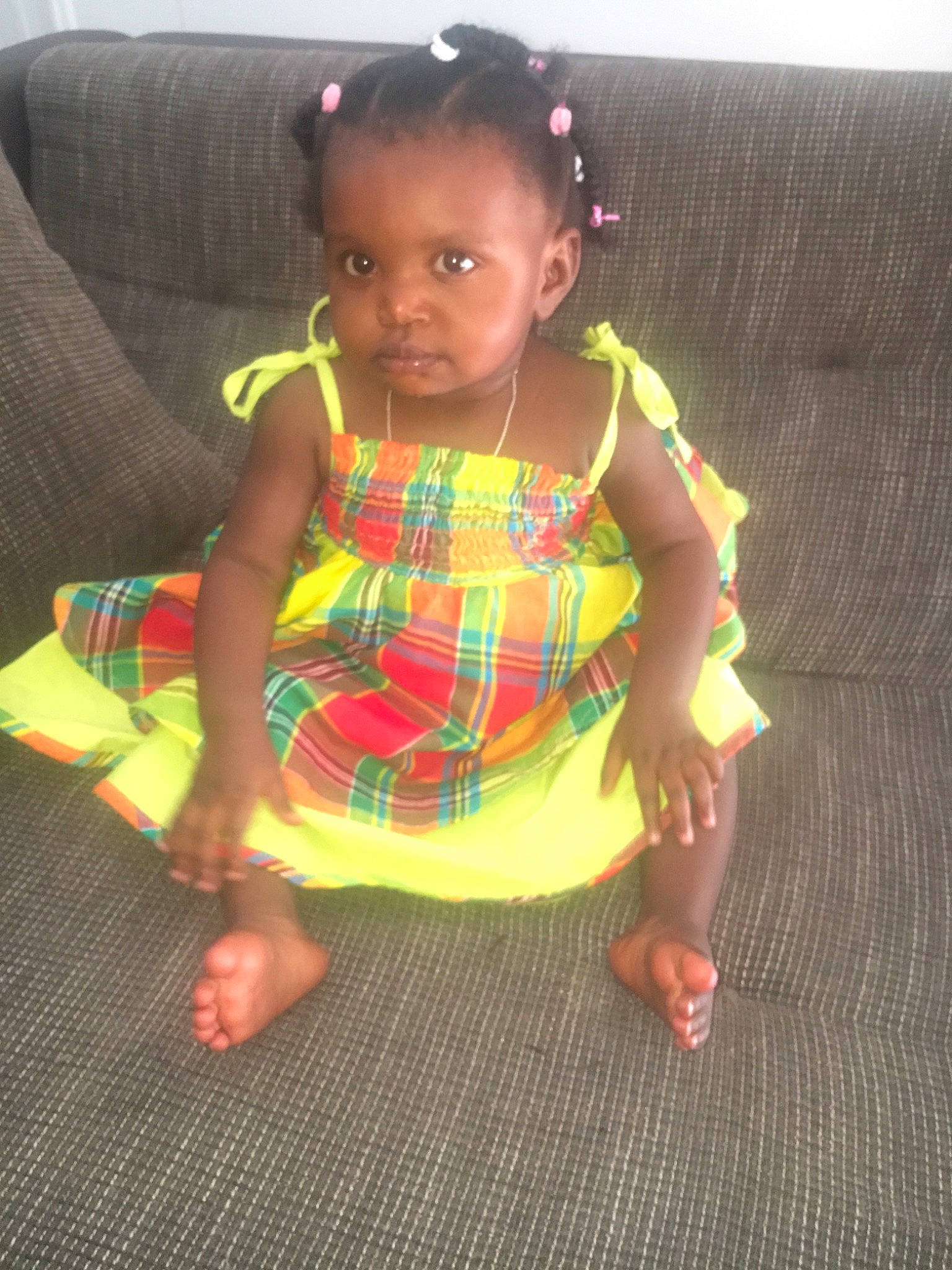 Théana participe au concours pour gagner de l'argent avec cette photo : arm, child, day, design, fun, girl, green, hair, hairstyle, infant, leg, pattern, person, plaid, play, product, sitting, skin, textile, toddler