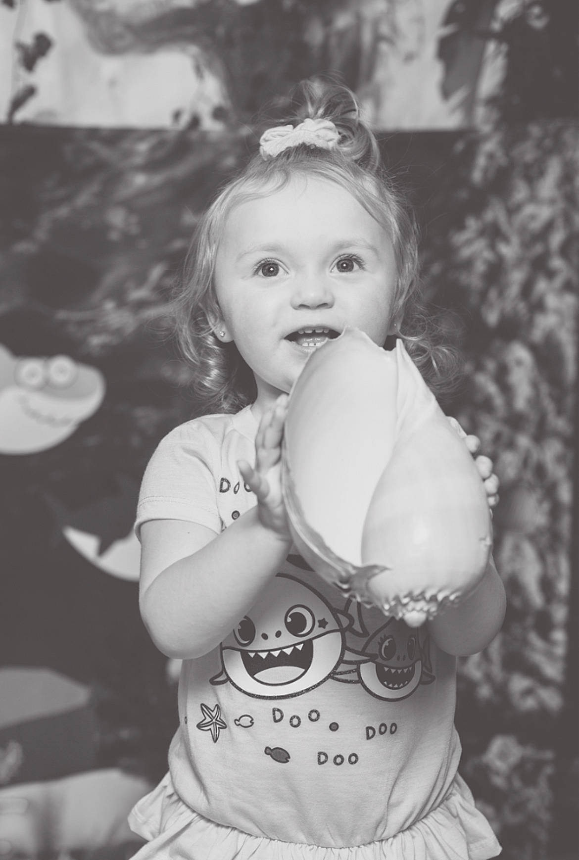 Harper is registered to the contest to win money with this photo: baby, beauty, black_and_white, child, eye, flash_photography, gesture, grass, hairstyle, happy, iris, lip, monochrome, people_in_nature, person, photograph, smile, standing, style, toddler