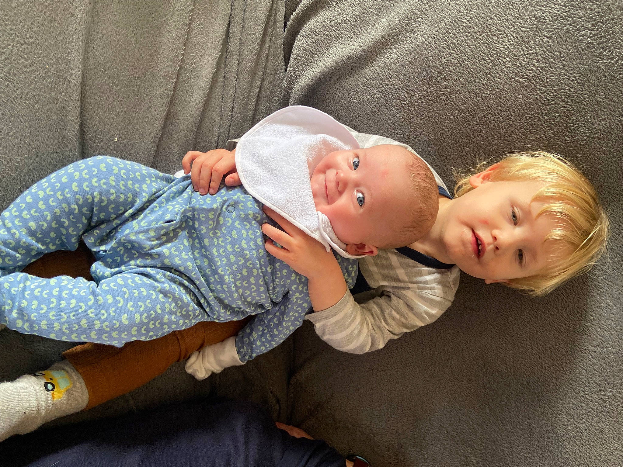 Edwin joined the competition — help win amazing prizes! baby, baby_products, baby_toddler_clothing, cheek, child, comfort, elbow, human_leg, knee, lap, pattern, person, sitting, skin, sleeve, smile, sock, textile, thigh, toddler