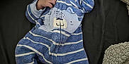 Tidus is registered to the contest to win money with this photo: baby, sleeping, onesie, blue_stripes, bear_design, blanket, infant, child, cute, cozy, soft, resting, peaceful, portrait, bedtime, clothing, person, indoors, newborn, footed_pajamas