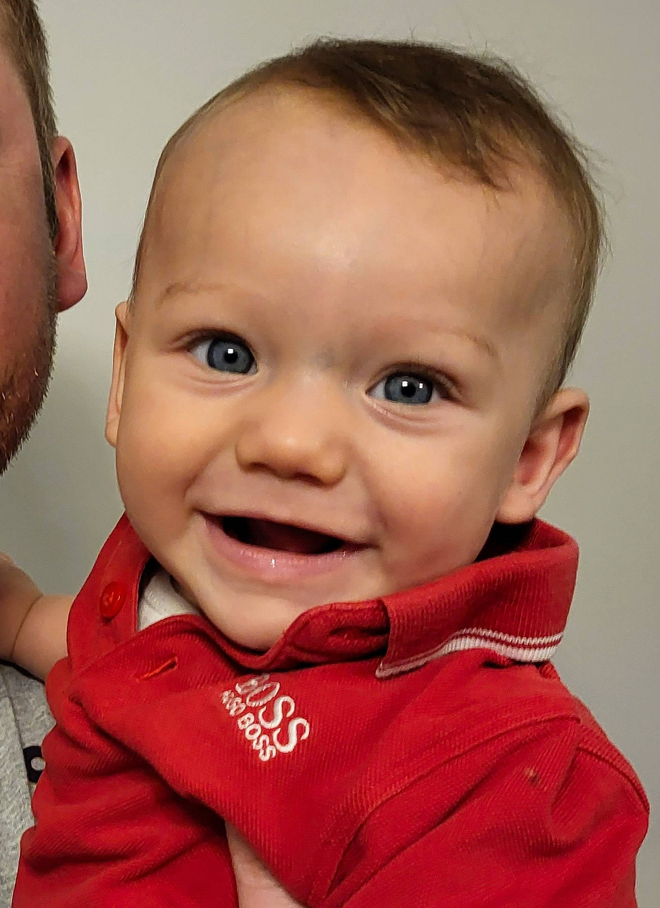 Harrison is registered to the contest to win money with this photo: baby, baby_toddler_clothing, cheek, collar, comfort, ear, eyelash, finger, fun, gesture, happy, iris, joy, lip, mouth, nose, outerwear, person, skin, sleeve