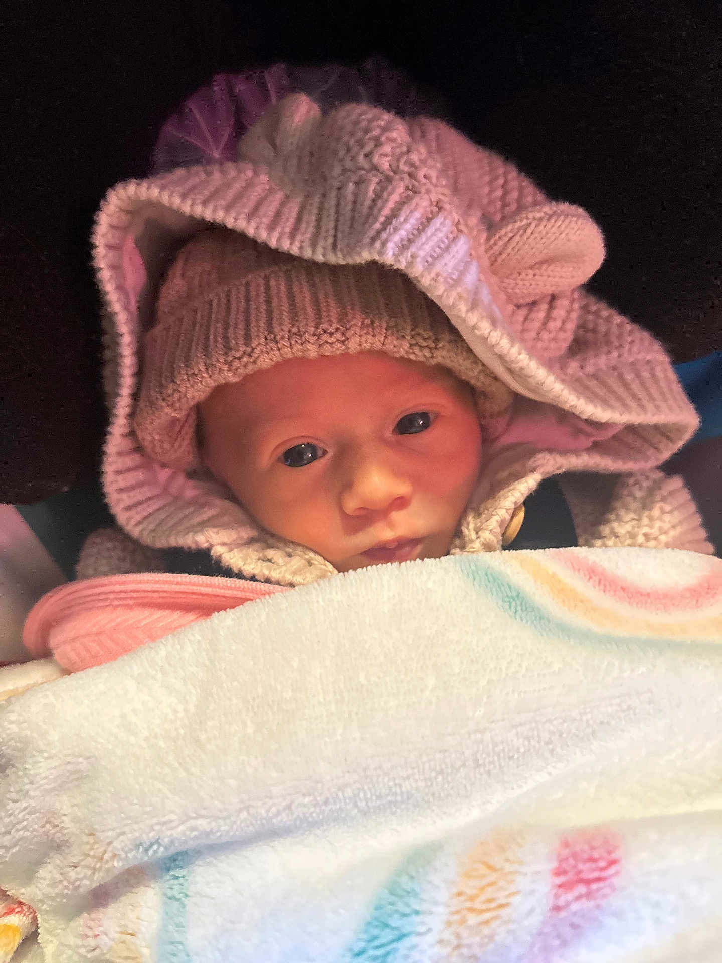 Wynter joined the competition — help win amazing prizes! baby, infant, knitted_hat, hood, blanket, warm_clothing, face, newborn, cute, soft_texture, indoor, closeup, bundle, sleepwear, child, person, cozy, pink, warmth, portrait